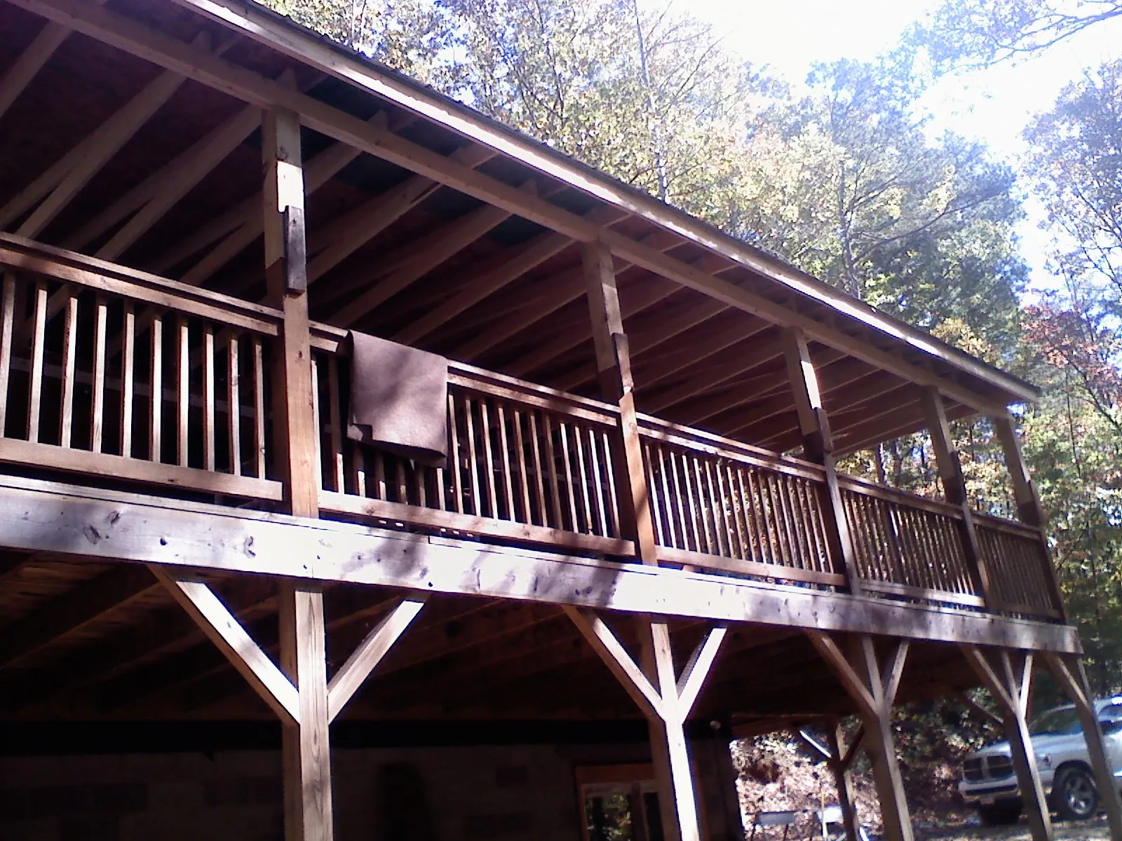 Timber framing under a new elevated porch and deck — Roof Leak Repair in Flomaton by Roofing Brothers